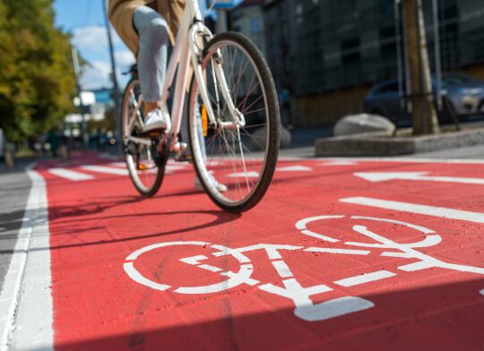 Cyclist riding in dedicated bike lane in Vancouver — relevant to bicycle accident lawyer services and ICBC claims assistance.